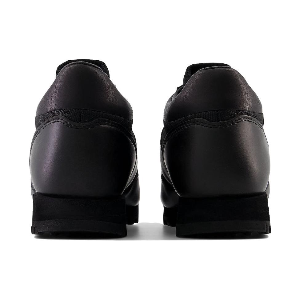 New Balance Rainier Low Triple Black Unisex-Sneakers UALGSBBB