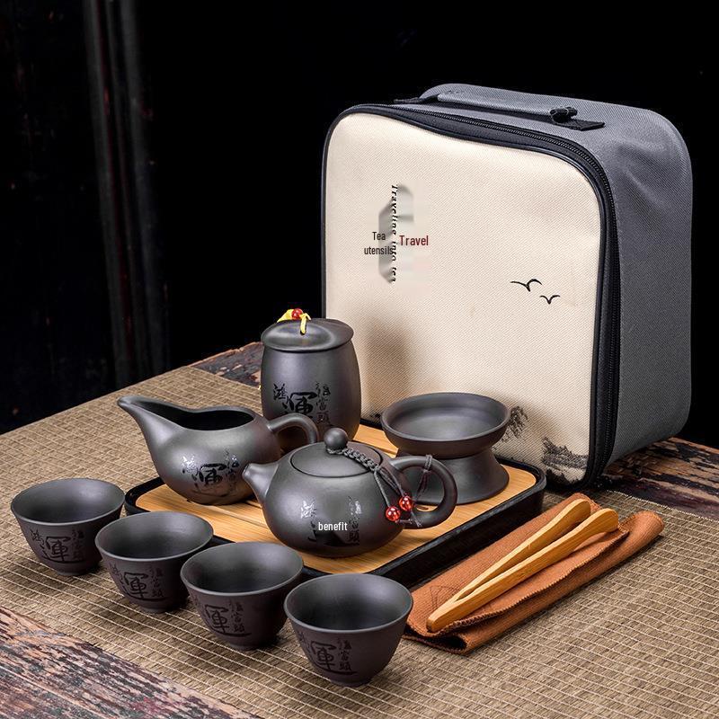 Creative Zisha Travel Kung Fu Tea Set: Portable Storage with One Pot and Four Cups - Ideal for Company Events and Gifts, Customizable with Logo.