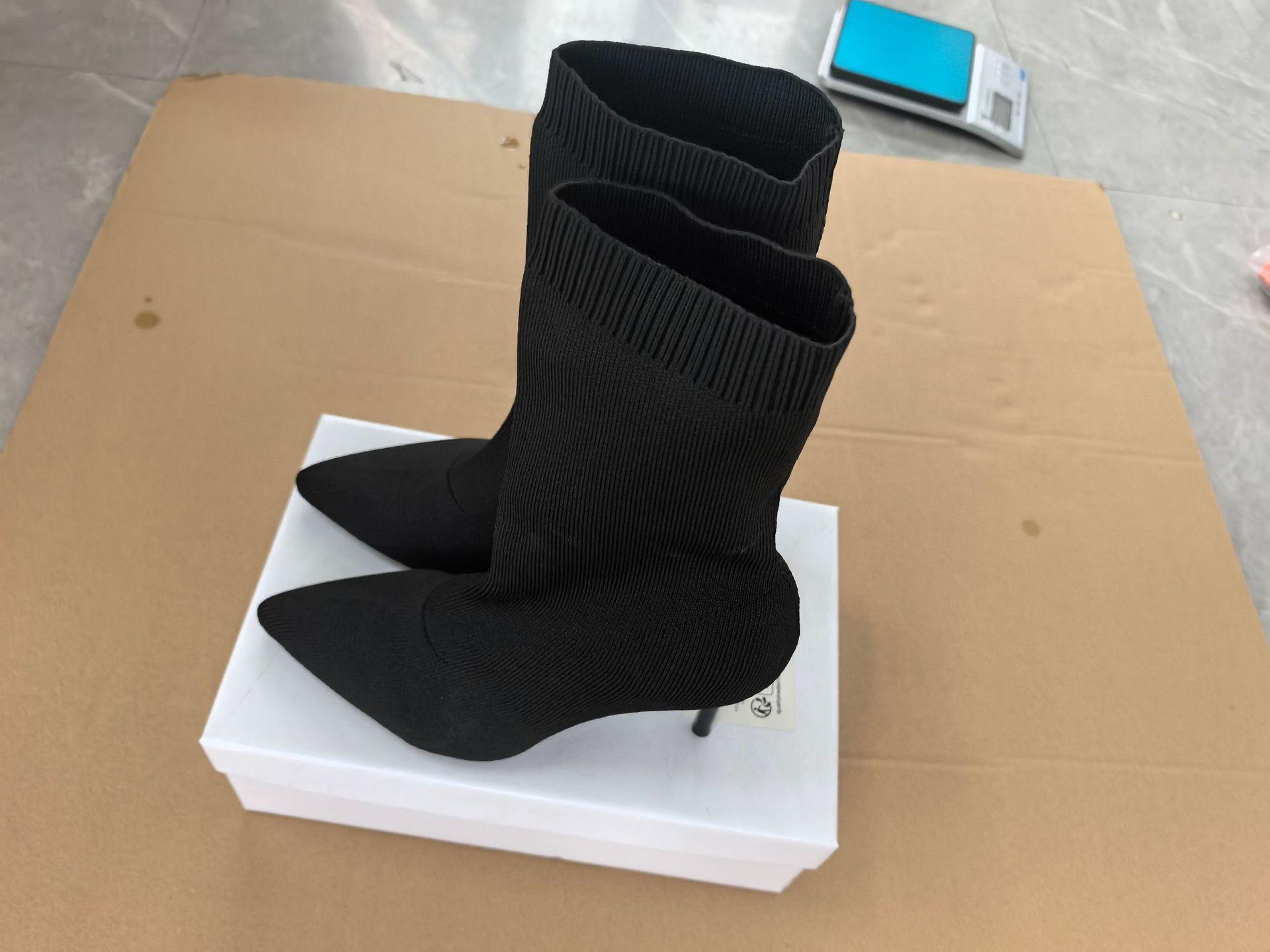 

Европейский и американский стиль внешнеторговые большого размера высокие каблуки вязаные короткие ботинки 2025 интернет-знаменитость остроносые тонкие ботинки новые эластичные ботинки 42