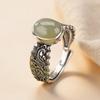 Elegant Tang Dynasty Style Ring with Hollow Oval Stone
