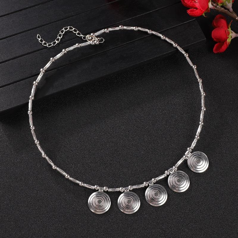 Vintage tassel collar hollow flower seedling silver pendant necklace niche personality collarbone chain women