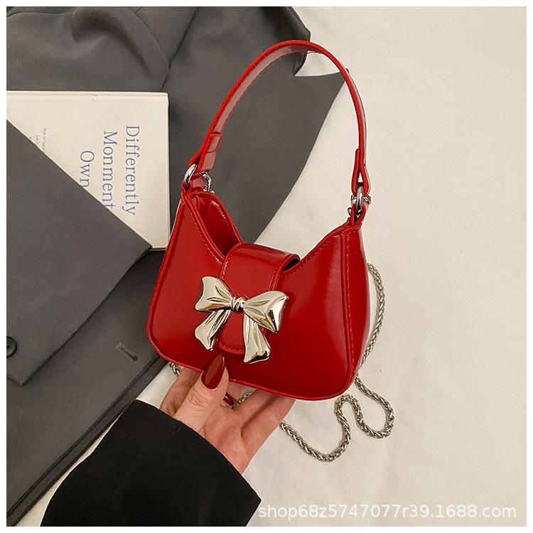Foreign style mini small bag women 2025 new Korean version versatile bow portable shoulder crossbody small bag mouth red envelope