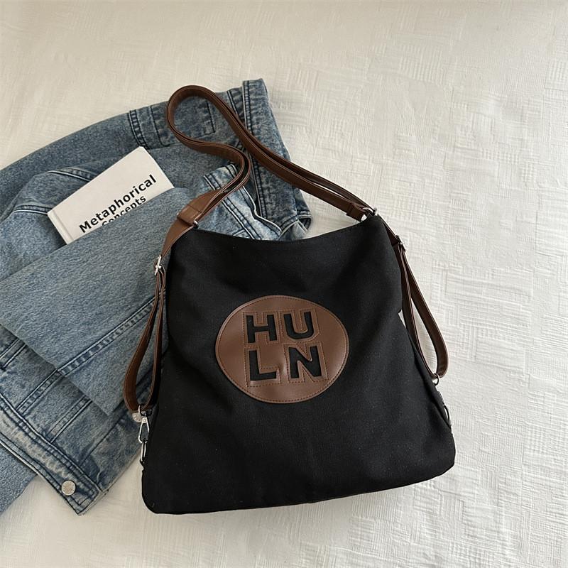 Стильная вместительная сумка-тоут для студентов Модный дизайн из черного или белого холста чёрный