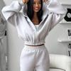 Casual women's suit European and American hoodie long-sleeved zipper cardigan sweater sports elastic trousers two-piece set