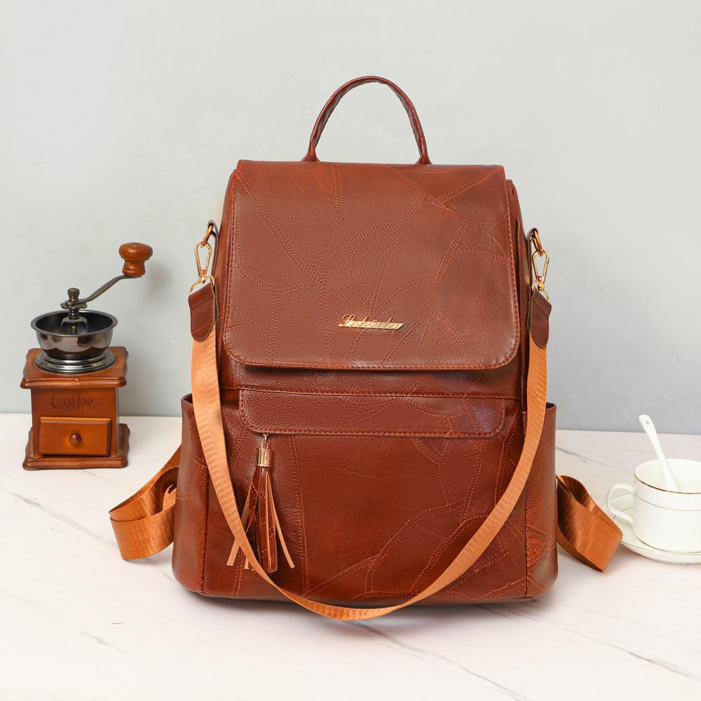 Женский многофункциональный рюкзак из мягкой кожи с кисточками в стиле ретро — фото 4
