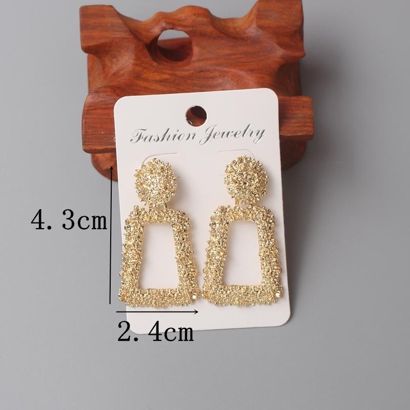 Przesadna geometria Nieregularne metalowe wiszące kolczyki Spiralny skręcony węzeł Okrągłe gładkie Brincos Cyrkonia