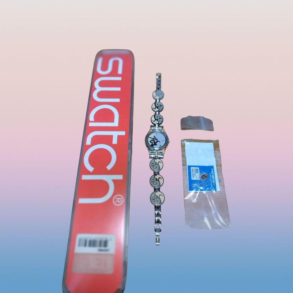 Used Swatch women's, also okay as a bracelet! Stylish