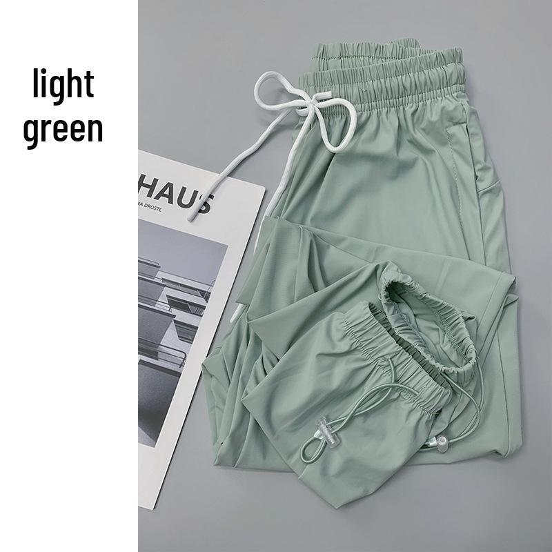 Women's Plus Size Ice Silk Quick-Dry Sports Pants - Breathable, Elastic & Perfect for Yoga and Running.
