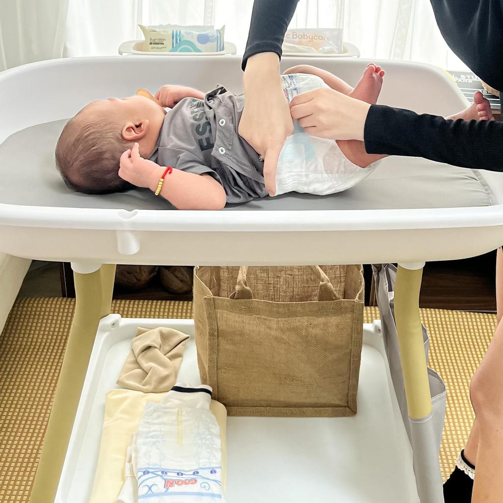 Height-Adjustable Multifunctional Baby Changing and Bathing Table