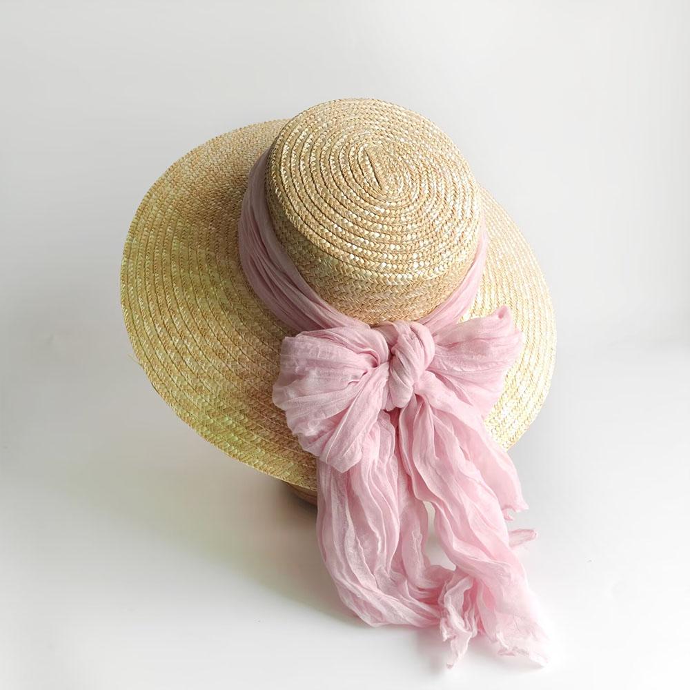 Women Raffia hat French style Summer Straw Sun Hat Women Wide Brim Beach Cap Breathable Hollow Holiday Panama hat Leather Bow