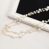 Korean Long Pearl Necklace: Trendy Multi-layer Hollow Flower Sweater Chain for Women