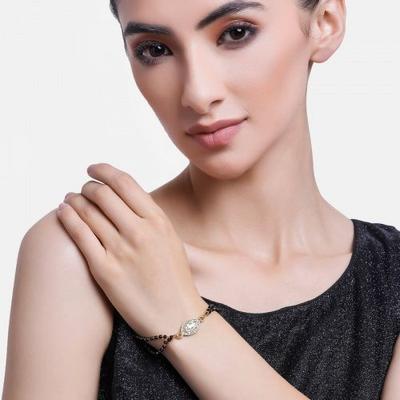 Evil Eye vergoldetes Armband mit schwarzen Perlen, österreichischen Kristallen und Kundan für Damen