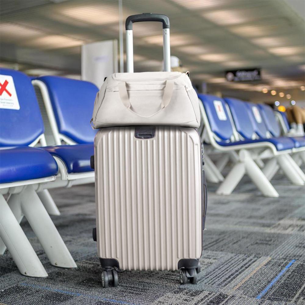 Large ecru sports travel training bag, hand luggage, tourist bag