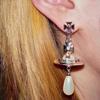 **Empress Dowager Saturn Pearl Earrings - Luxury Fashion Statement**