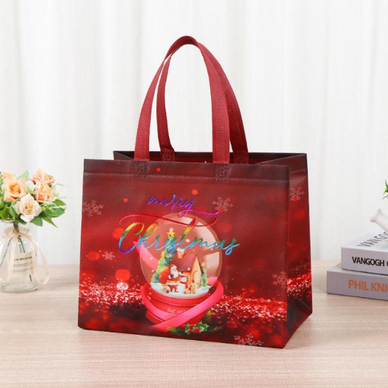 Borsa regalo di Natale Borsa per imballaggio regalo di caramelle in tessuto non tessuto di grande capacità con pupazzo di neve e design di Babbo Natale