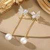 Elegant Two-Way Butterfly Pearl Tassel Earrings: Versatile, Slimming Studs for a Sweet, High-End Look.