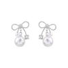S Simple and stylish high-end earrings, earrings, small and delicate bow pearl stud earrings.
