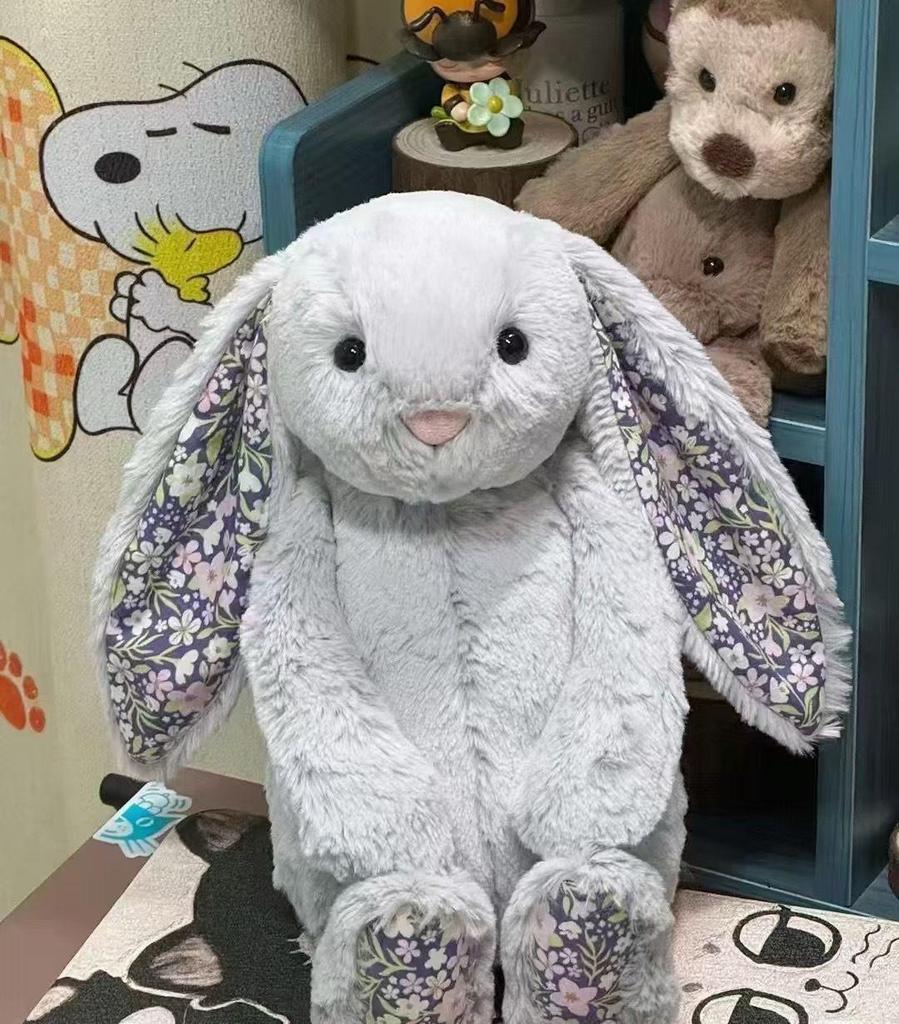 Floral Bunny Doll In White, Deep Pink, Light Pink, Brown, Grey, and Purple by Jellycat