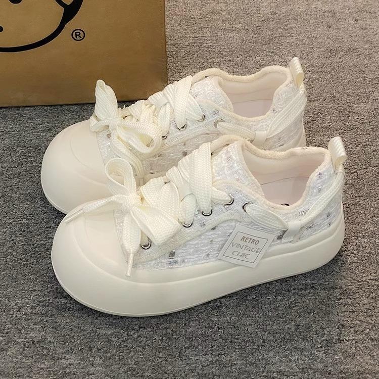 

Xiaoxiangfeng little white shoes women s 2025 spring new popular platform canvas shoes bread shoes with skirts school board shoes 40