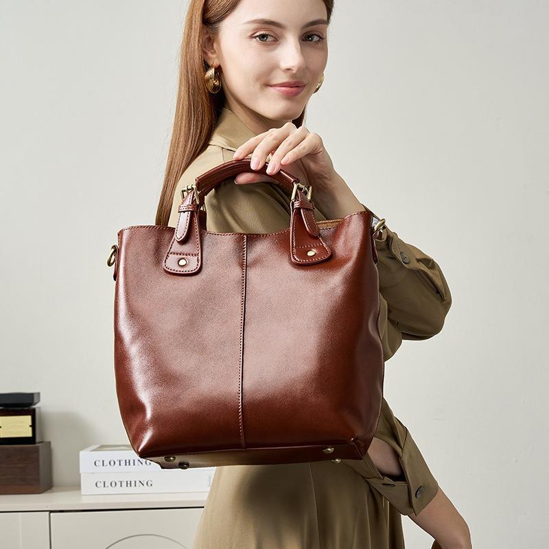 Lederbeutel Damen Retro pflanzlich gegerbtes Rindsleder Messenger Eimerbeutel vielseitig High-End Pendler tragbare Tote Bag