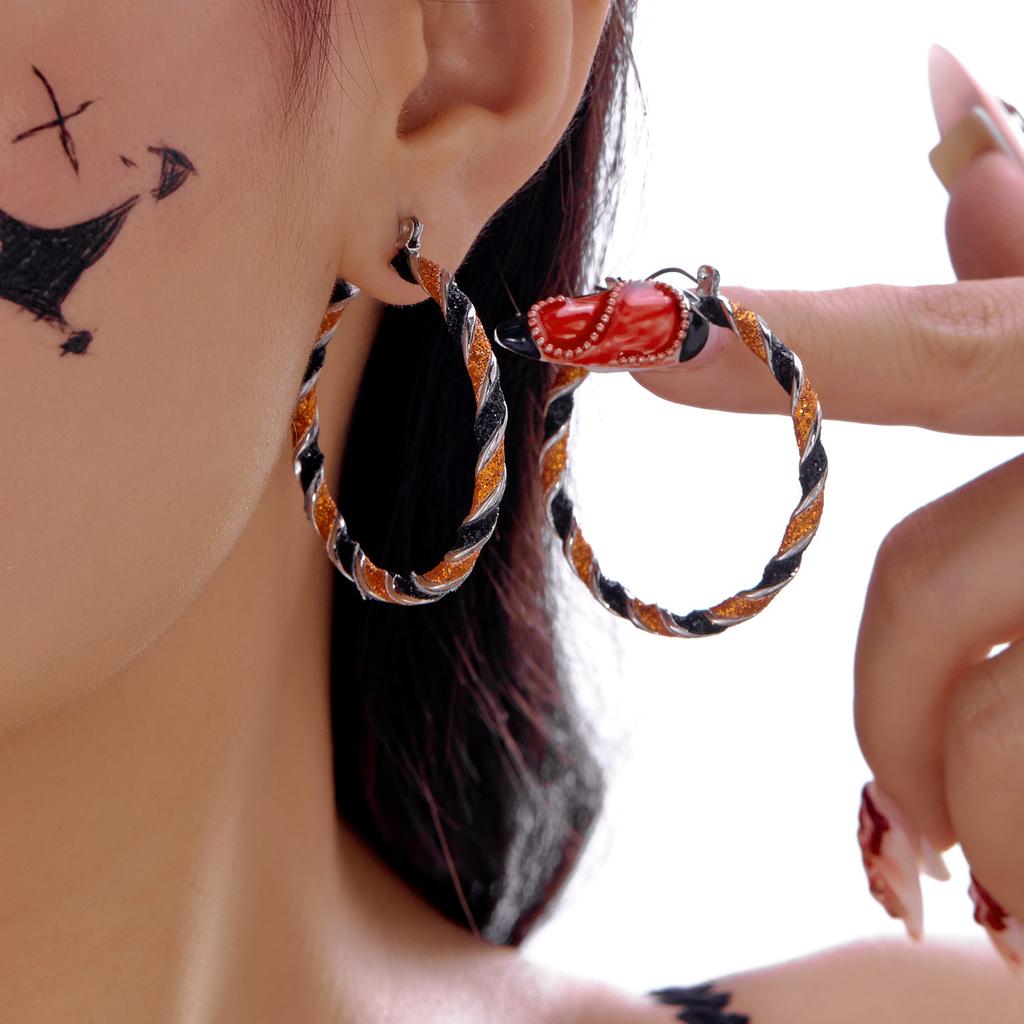 Popular Halloween earrings series, dripping pumpkin ghost black orange twisted earrings female, niche design sense