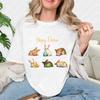 Süße Osterhasen spielen mit Eiern Entzückendes Frühlingshasen-Design für T-Shirt Grafik-T-Shirts Damenbekleidung Harajuku Yk Oberteile