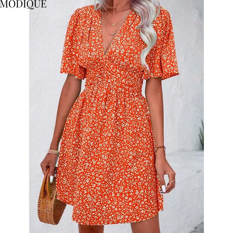 MODIQUE 2025 Summer New Women's Sexy Casual Floral Printing Ruffles Elastic Waist Short Dress Ladies X-Line Hot Batwing Sleeve V-Neck Dress