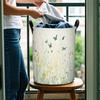 1pc Laundry Basket, Light Floral and Butterfly Design. Round Laundry Basket, Ideal for Organizing Clothes and Sheets, Made of Polyester, Ideal for Org