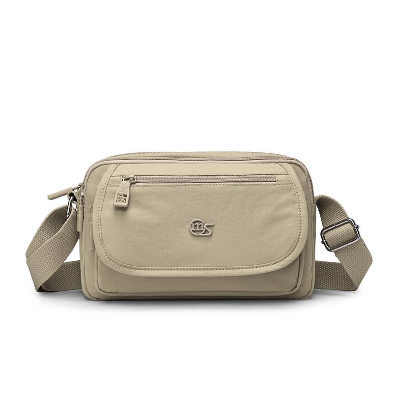 Kompaktní crossbody taška s více kapsami na zip pro muže a ženy