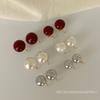 Wine red pearl mosquito coil disc ear clips, no ear piercings, painless earrings, simple and fashionable commuter temperament stud earrings