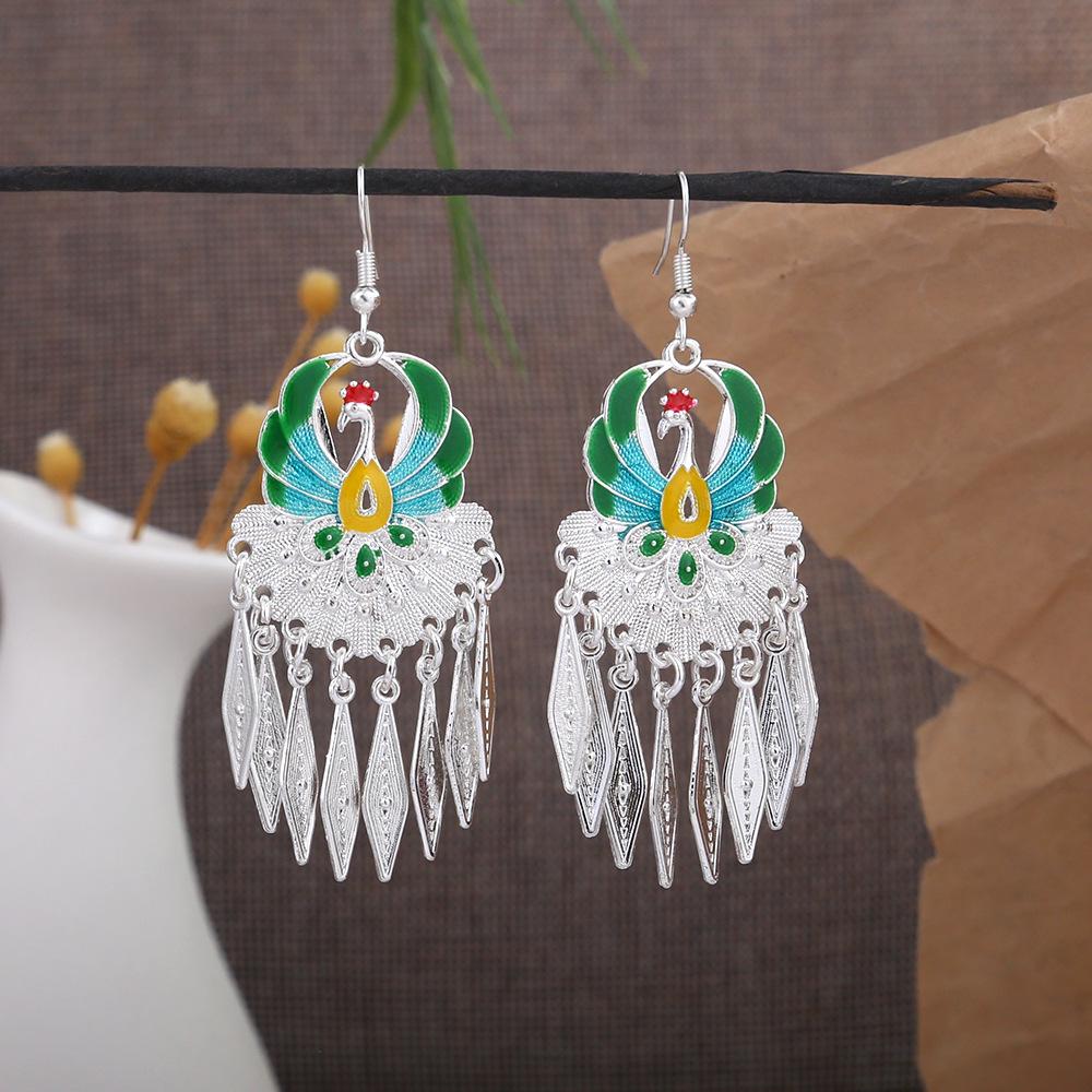 Cloisonné Pfau Ohrringe: Miao Silber Phönix Totem Glockendesign, Beliebt an landschaftlich reizvollen Orten