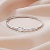 Gold-Plated Diamond-Inlaid Titanium Steel Women's Bracelet: Elegant, Versatile, and Luxurious.