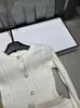 French Elegant Spring Knit Cardigan: Solid Color, Round Neck, Slimming Waist-Cinch, Long Sleeve, Versatile Top