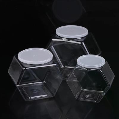 Tragbares Transparentes Sechseckiges Süßigkeiten-Keksglas Kunststoffverpackungsgläser Mit Deckel Versiegelt Lebensmittelaufbewahrungsbehälter Küchenbedarf