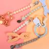 Siliconen fopspeenketting voor baby's met roestvrijstalen clip.
