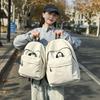 Casual large-capacity backpack fashionable outdoor lightweight junior high school students solid color simple schoolbag Korean version travel backpack