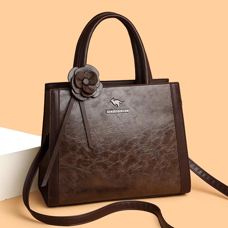 Elegant Faux Leather Tote Bag with Flower Decoration and Adjustable Shoulder Strap