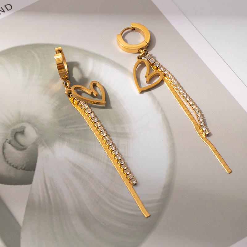 Geometric Hollow Heart Tassel Earrings: Titanium Steel Studs with Light Luxury Design.