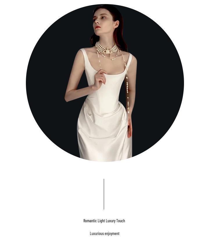 2025 Retro Satin Light Wedding Dress - Simple Spaghetti Strap Gown with Small Train