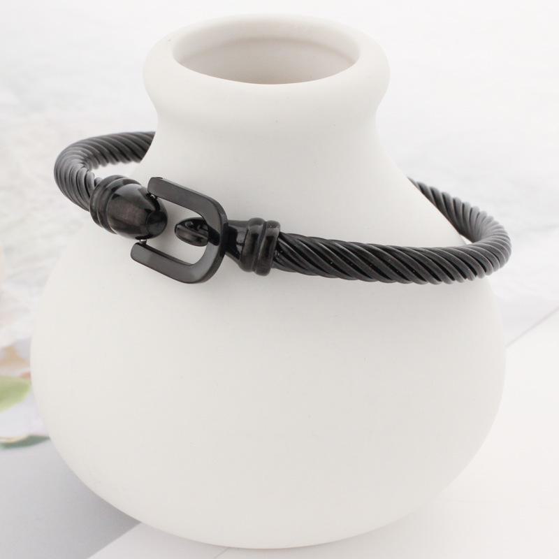 Europeiskt och amerikanskt retrohästskospänne i rostfritt stålarmband