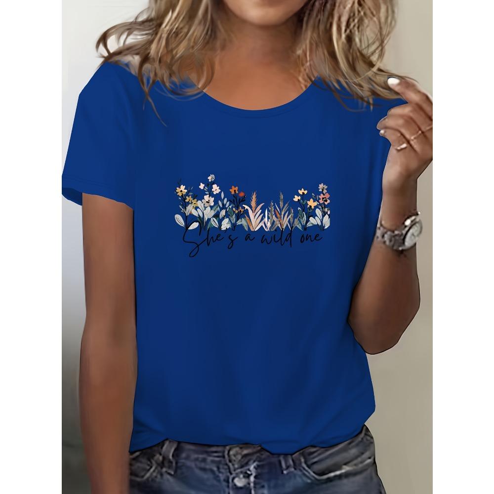 Women's Casual Short Sleeved Round Neck T-shirt with Vibrant Blue Floral Print Featuring "She's Wild At Heart" Reference To Women's T-shirt
