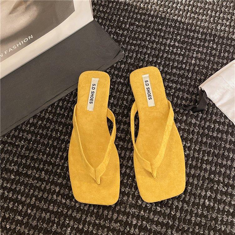 

Korean version of simple flat-bottomed open-toed slippers female summer wear niche woven skirt fairy beach cool slippers 36