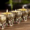 Leichter Luxus Retro Metall Lotus Butterlampe Halter für den Heimgebrauch Buddha Kerze Tischlampen Halter Lange Lichtlampe feng shui 2 Stück