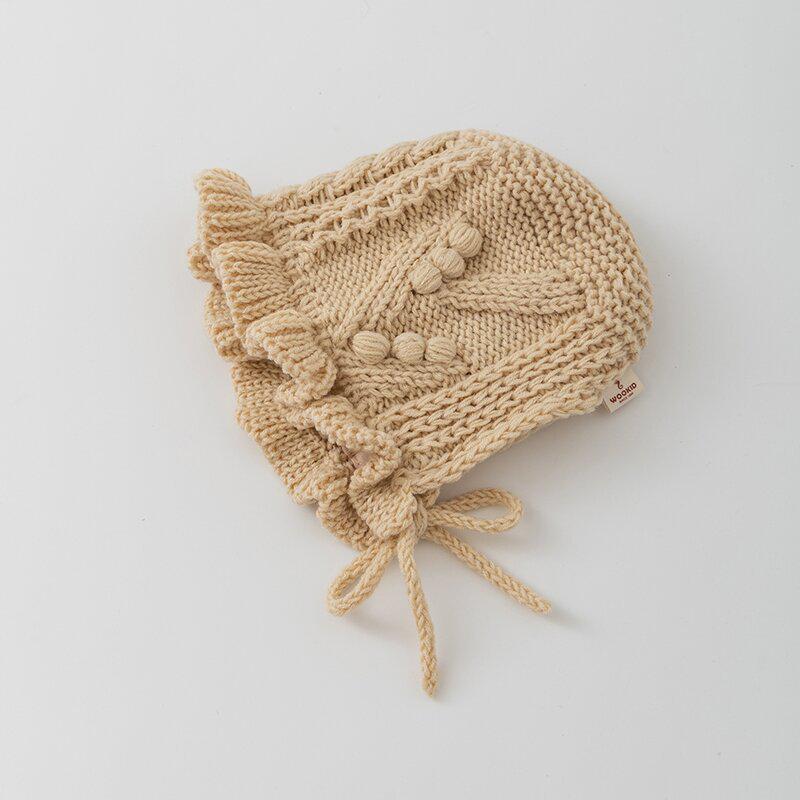 Korean-Style Hand-Knitted Wool Hat for Newborns – Warm, Windproof, and Ear-Protective for Boys and Girls.