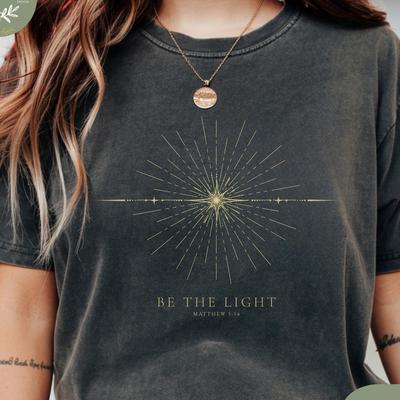 Be The Light Shirt Minimalist Christian T-Shirt Matthew 5:14 Bible Verse Tee Celestial Faith Shirt Vintage Star Design Christmas Shirt