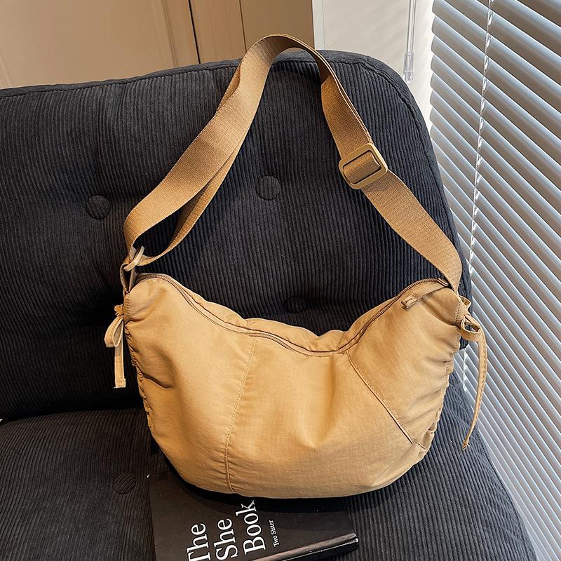 

Dumpling bag Women s messenger bag Large capacity sports bag Cycling shoulder bag Fitness bag Student nylon cloth bag