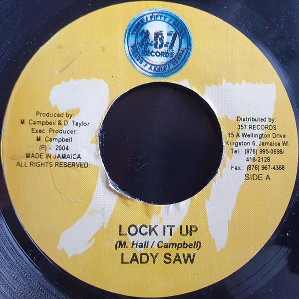

7-дюймовая пластинка LADY SAW / WAYNE WONDER - Lock It Up / Guns Blazing NONE 357 Records 2004 Ямайка Регги, Ска и Даб Б/У