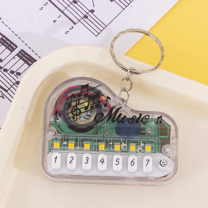 Mini Handheld Luminous Electronic Piano Keychain for Kids