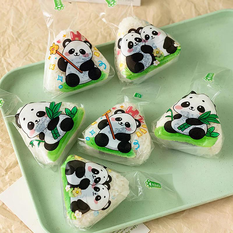 100 ks Krásný kreslený trojúhelník Balicí sáček s rýžovými kuličkami Mořské řasy Onigiri Sushi Nástroje na výrobu forem Bento Příslušenství