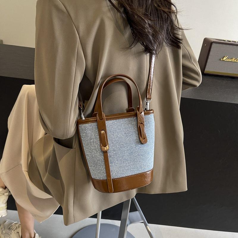 Popular contrasting color bucket bag women's new small bag fashionable portable shoulder bag textured messenger bag